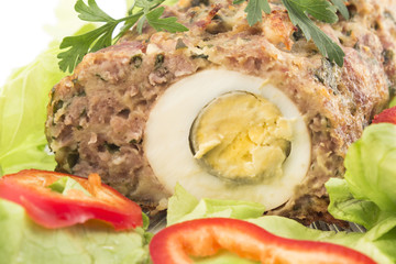 Meat loaf with boiled eggs
