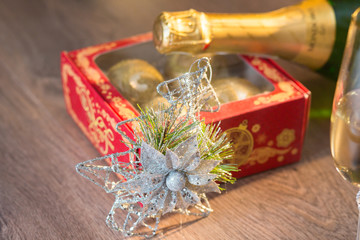 Glasses of champagne with gift box