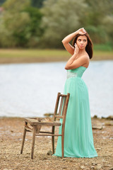Freedom Concept. Girl standing on the beach