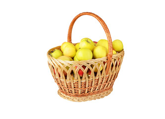 Apple in a wattled basket, isolated on white background