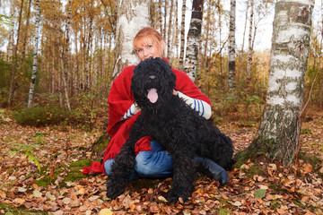 Woman with Black Russian Terrier
