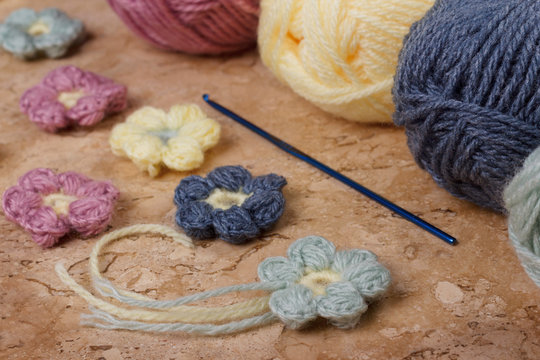 Handmade colorful crochet flower with skein