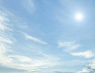 Obraz premium clouds and sun in the blue sky