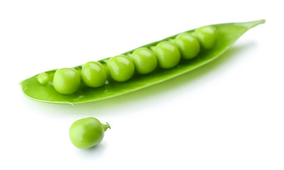 Fresh green peas isolated on white