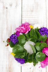 Flower wreath decoration on wood.