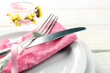 Summer table setting  on color wooden background