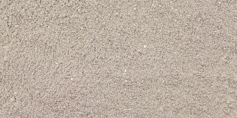 Fototapeta na wymiar Natural brown sand texture and seamless background