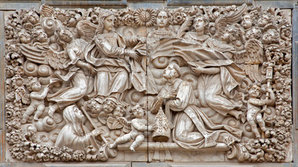 Toledo - relief from portal of church Iglesia de san Idefonso
