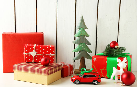 Christmas gifts on wooden background