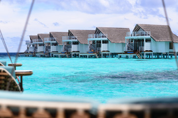 Water bungalow built on blue sea at Maldives, luxury resort