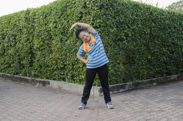Fototapeta premium Portrait of Asian Elderly Exercise in the park