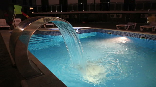 Swiming pool with glowing water