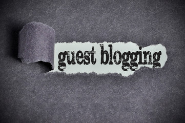 guest blogging word under torn black sugar paper