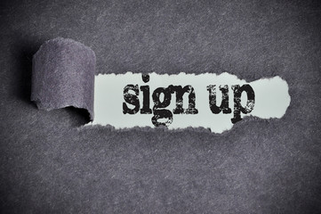 sign up word under torn black sugar paper