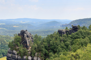 Obraz premium Panorama with Group of rocks Affensteine seen from Schrammstein viewing point in Saxon Switzerland