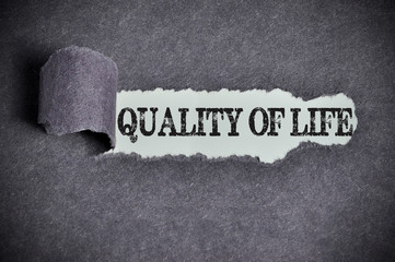 quality of life word under torn black sugar paper - 94186431