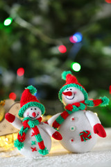 Cute snowmen on Christmas background