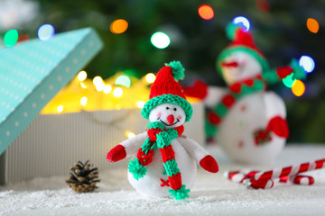 Cute snowmen on Christmas background