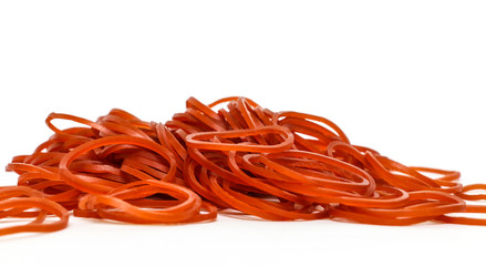 red rubber bands on white background