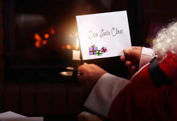 Santa Claus reads letters from children