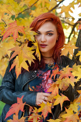 Naklejka na ściany i meble beautiful girl in autumn scene