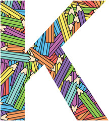 Letter K on color crayons background