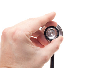 Hand holding stethoscope. All on white background