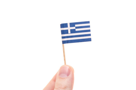 Hand holding greek flag. All on white background