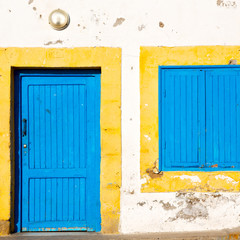 old door in morocco   yellow window