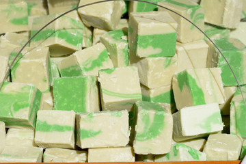Bright colorful fudge for sale at market stall during food festival