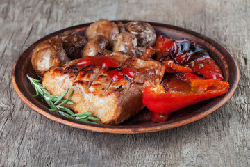 meat and vegetables cooked on the barbecue