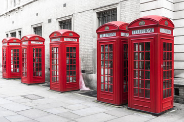 Traditional red telephone boxes in London, UK