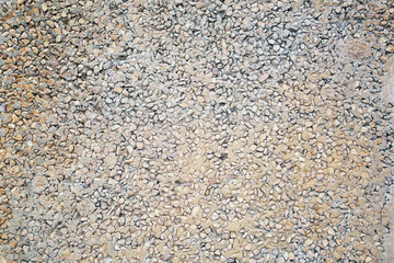 Old stone pavement as a background, top view, horizontal