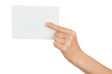 Humans hand pointing at blank paper