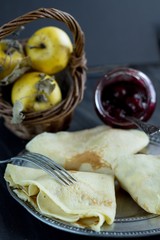 French crepes, jam and apples - sweet breakfast