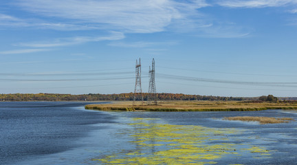 Power lines in a beautiful autumn landscape