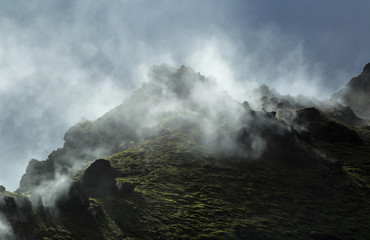 Hot steam from a geothermal pool in Landmannalaugar, Iceland.