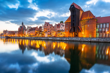 Fototapeta na wymiar Old town of Gdansk with ancient crane at dusk, Poland