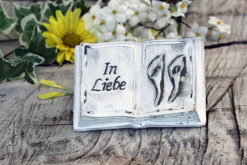 Buch mit Trauerspruch