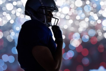 Side view of silhouette american football player