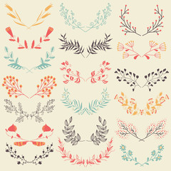 Set of hand drawn symmetrical floral graphic design elements in retro style.