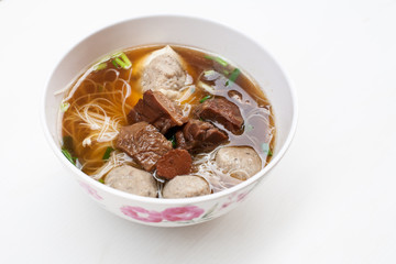 Thai noodle with beef and pork on white background 