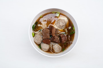 Thai noodle with beef and pork on white background 