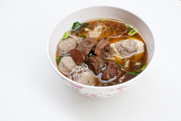 Thai noodle with beef and pork on white background 