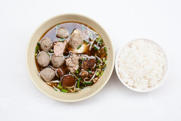Thai noodle with beef pork and meatball on white background 