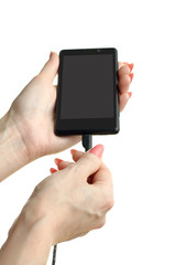 discharged mobile phone in the hands of a young girl on a white isolated background