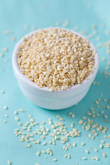 sesame seeds on wooden surface