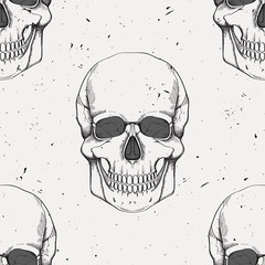 Vector grunge seamless pattern with human skulls