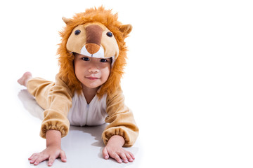 Little lovely asian boy costumed like a lion. Isolated on white