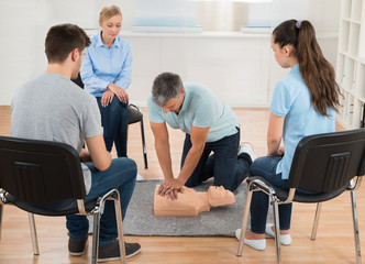 Instructor Teaching First Aid Cpr Technique